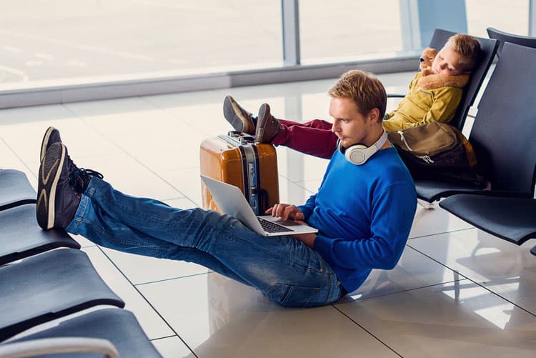 dad in airport with travel anxiety