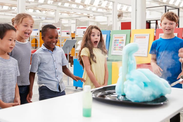 {UPDATED} Cool & Unusual Places for Kids in San Diego 13 kids watching experiment at children's museum