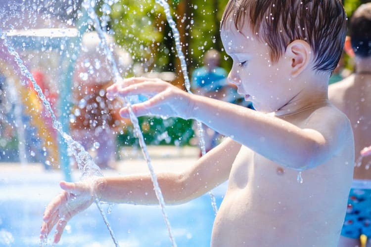 {UPDATED} Cool & Unusual Places for Kids in San Diego 10 boy at splash pad denver colorado