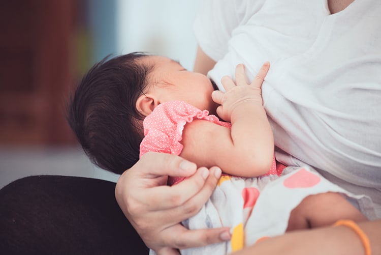How to Increase & Maintain Breast Milk Supply: Tips from a Holistic Certified Nutritionist 3 mother breastfeeding her baby girl