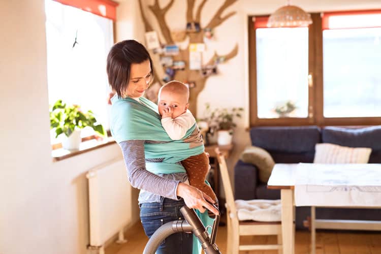 Indoor Air Pollution: How To Protect Your Baby 5 Woman Vacuuming Dust