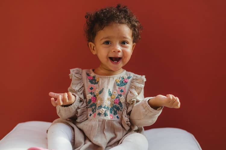{UPDATED} Is My Baby Teething? 2 little girl smiling