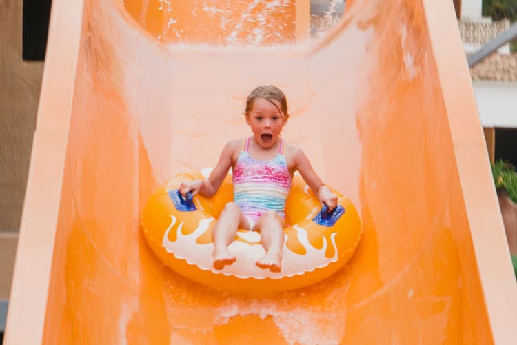 Hidden Gems Of Dallas: Best Places For Families 9 Child On Waterslide