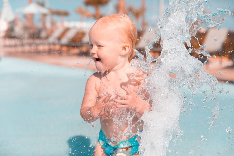 child playing in water