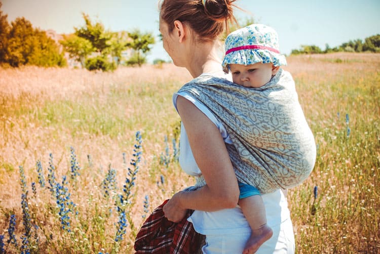 Austin, Texas: Fun Family-Friendly Activities in the Live Music Capital of the World 9 mother walking through field with baby on back