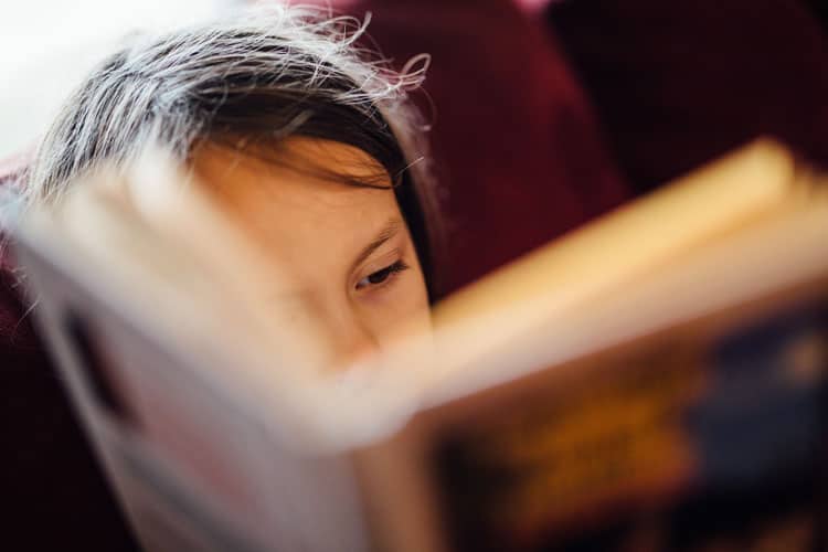 How to Help Your Child With Back-to-School Anxiety 9 child reading a book