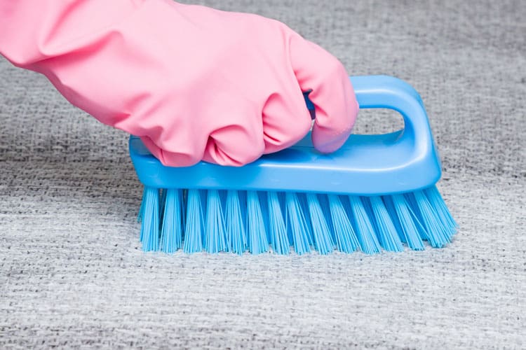 How to Clean a Stroller Like a Pro 4 scrubbing fabric
