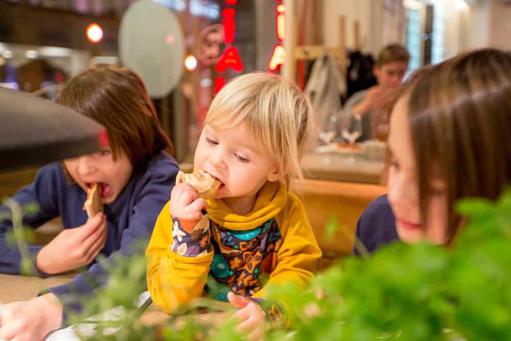 Child enjoying food at Sesame Place, highlighting allergy-friendly dining options for kids.