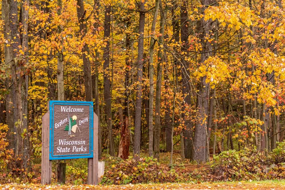 Welcome to Wisconsin State Park sign at entrance of Rocky Arbor State Park