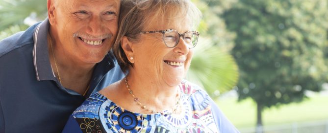 Happy Elderly Couple Enjoying Outdoor Day Trip In Orlando Area.