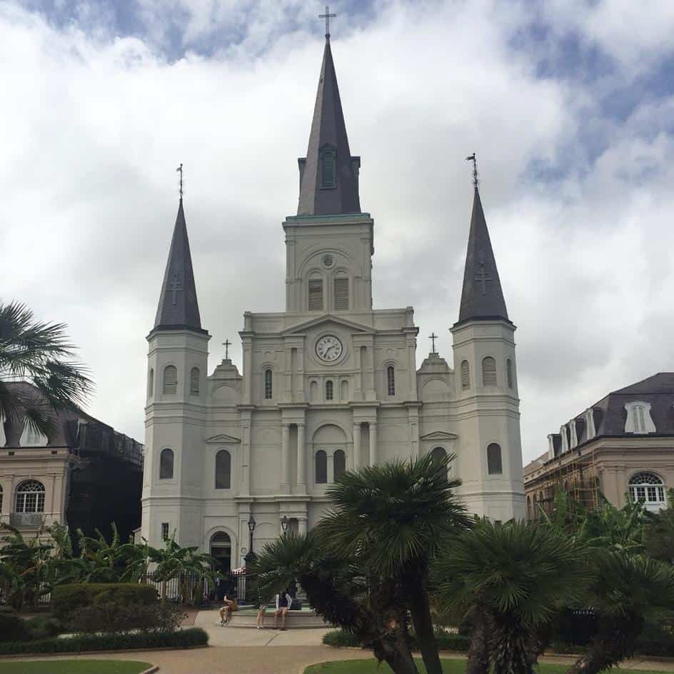 Jackson Square Cathedral in New Orleans with cloudy sky.